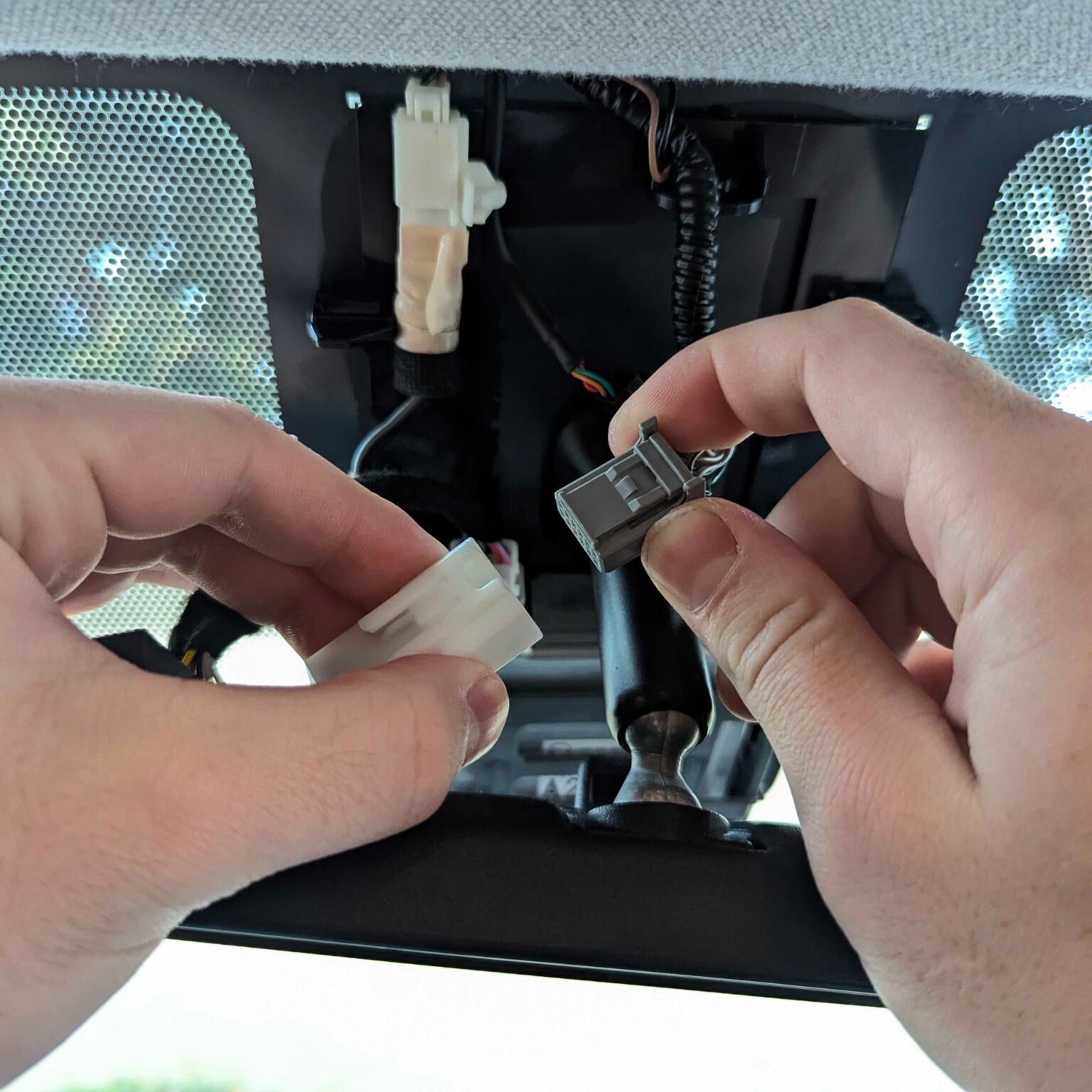 plug the car’s camera wires into the other end of the harness box